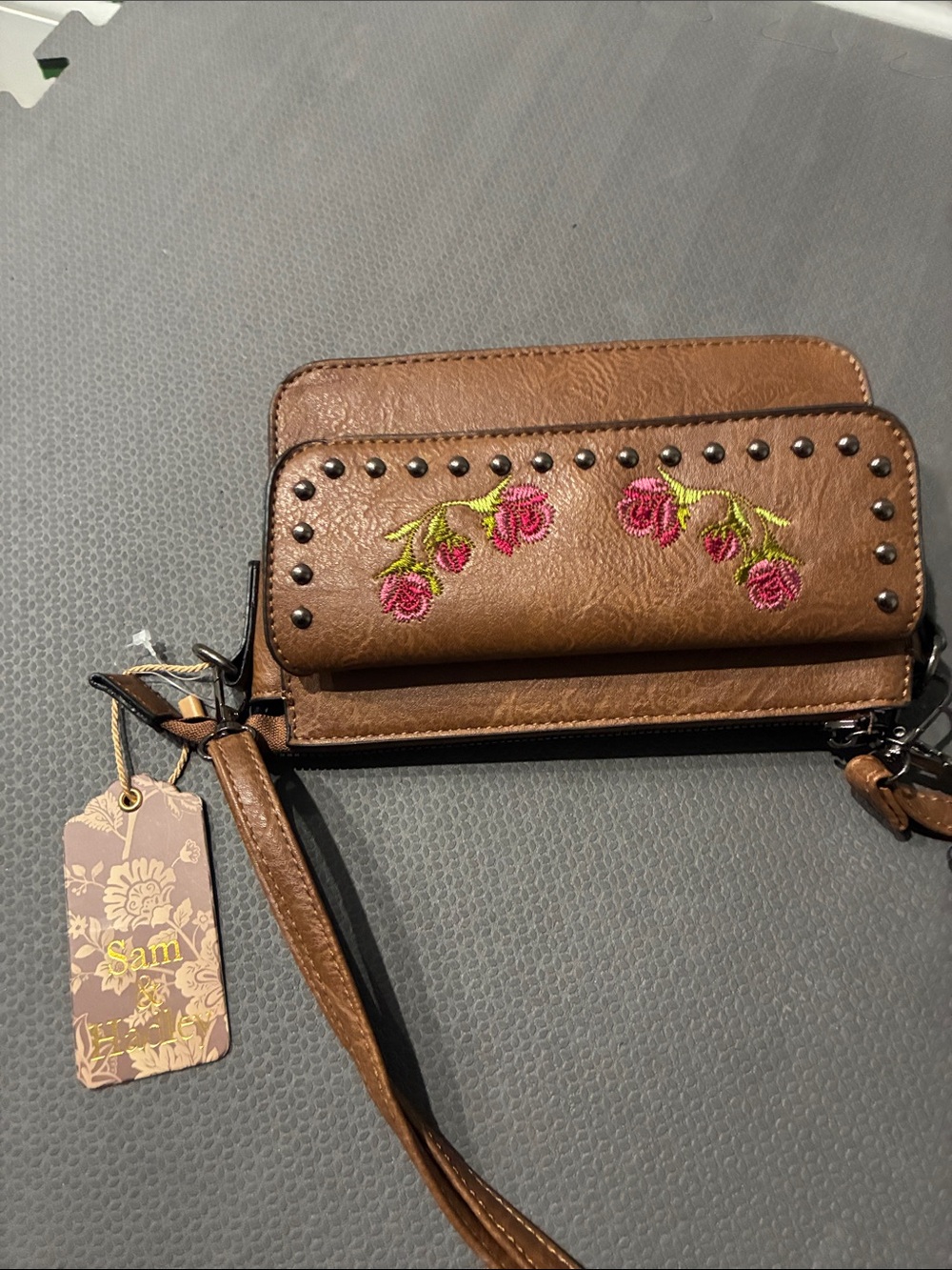 SAM. Brown Wristlet Clutch with Pink Floral Embroidery